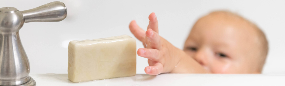 Michael reaching for goat milk soap