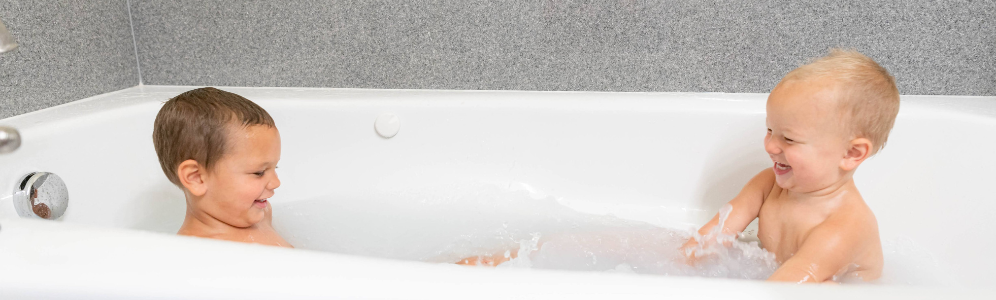 Michael playing in tub