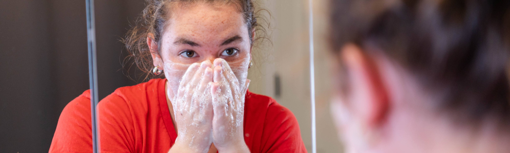 Indigo washing her face with goat milk soap