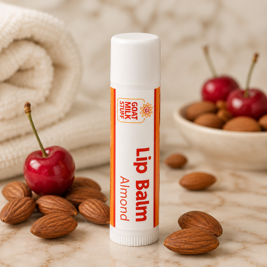 Lip balm with almonds and cherries on a marble surface