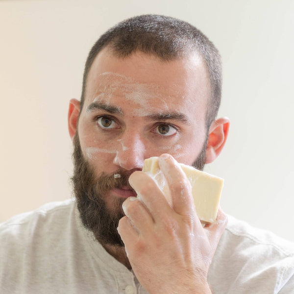 Man holding bar of soap