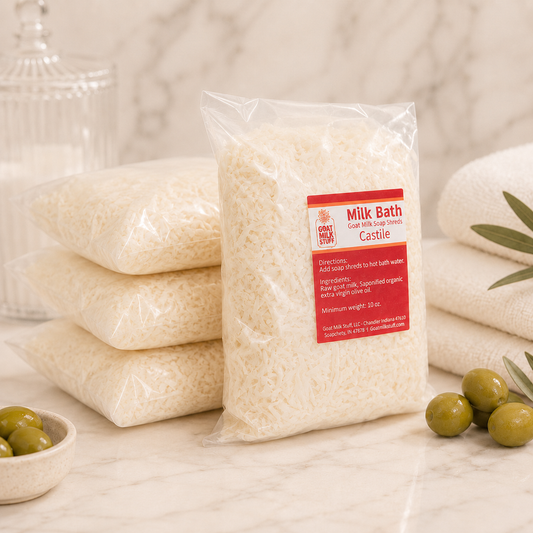 Packaged Castile milk bath product with a label on a neutral background
