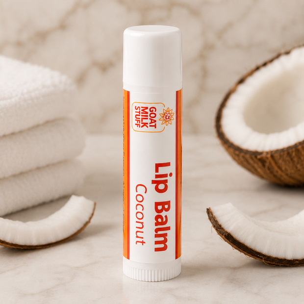Lip balm stick with coconut pieces on a neutral background