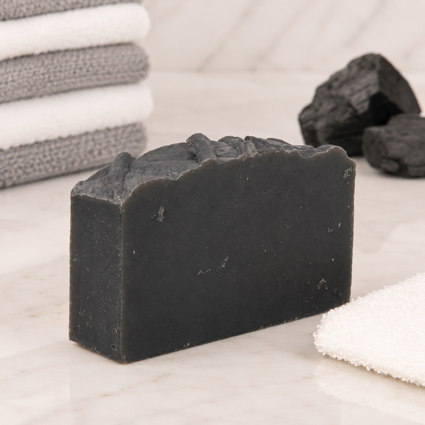 Bar of goat milk soap on a marble surface