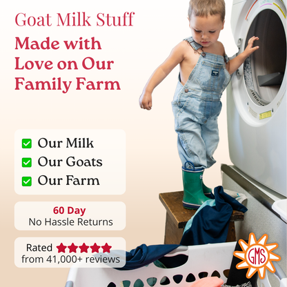 Child in overalls and rain boots standing on a washing machine with text about goat milk product and farm.