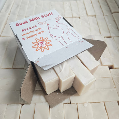 Four Purity goat milk soap bars in a Goat Milk Stuff box