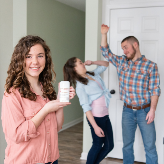 Indigo holding natural goat milk deodorant