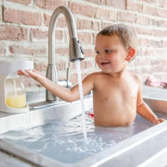 Landon playing in the tub