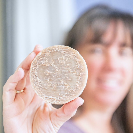 Pj holding Luffa Purity Goat Milk Soap